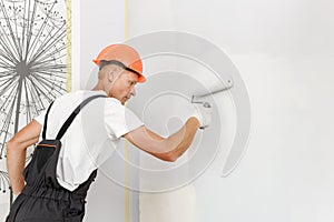 The worker is installs and connects the power supply of LED