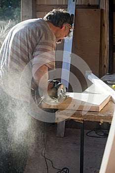 Worker with Jigsaws