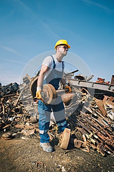 Worker in a junkyard