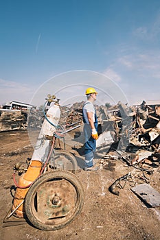 Worker in a junkyard