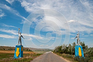 Worker and Kolkhoz Woman style statues by roadsides.