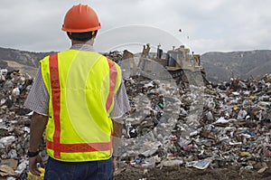 Worker At Landfill Site