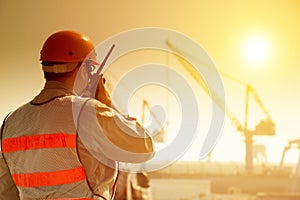 Worker with large crane site