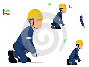 A worker is lifting something on the floor