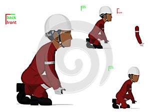 A worker is lifting something on the floor