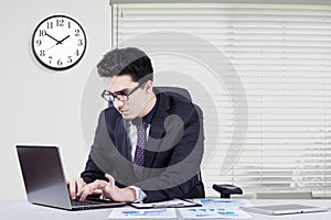 Worker looks concentration working in office