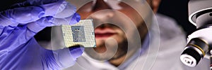 Worker making diagnostics of chip