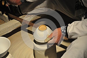 Worker is making a Porcelain bowl - Jingdezhen - Jiangxi Province â€“ China