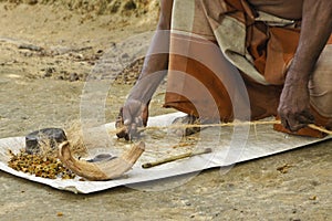 Worker making twine from coconut, Sri Lanka