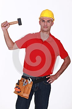 Worker with a mallet