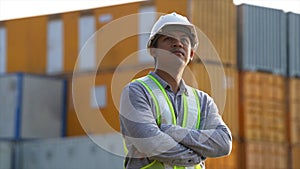 Worker man checking and control loading containers box from cargo