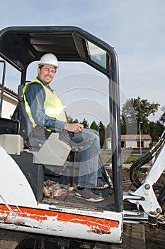 a Worker man on Forklift Looking at Camera