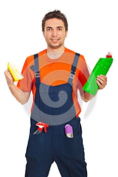 Worker man hold cleaning products