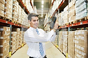 Worker man with warehouse barcode scanner