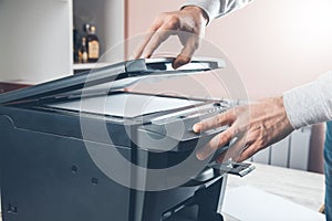 Worker man with xerox in office