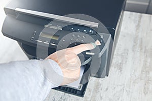 Worker man with xerox in office