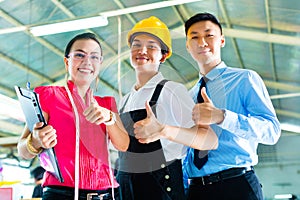 Worker, manager and designer in Chinese factory