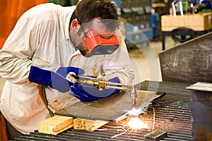 Worker in Metal Factory