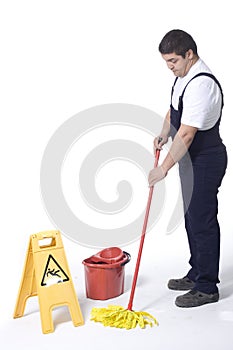 A worker is Mopping white floor