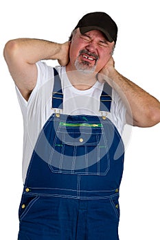 Worker with neck aches clutching his neck photo