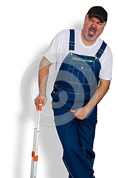 Worker clutching his groin in discomfort photo