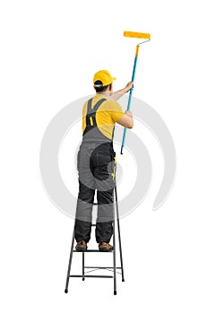 Worker - painter with tool roller brush