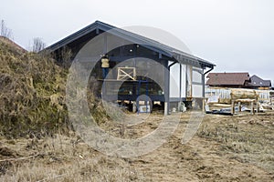 Worker painting a house