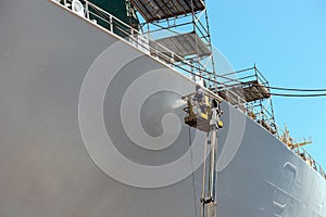 Worker painting of the ship