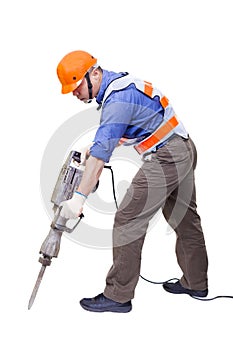 Worker with pneumatic hammer drill equipment
