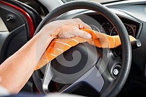 Worker Polishing Car Steering Wheel