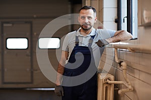 Worker Posing in Auto Shop