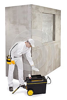 Worker pouring a primer photo