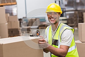 Worker preparing goods for dispatch