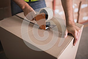 Worker preparing goods for dispatch