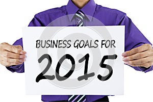 Worker presenting business goals for 2015