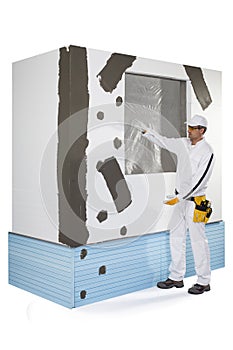 Worker presenting a reinforced window frame