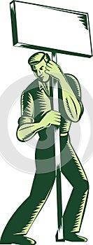 Worker protesting placard sign