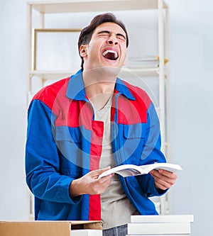 Worker in publishing house preparing book order