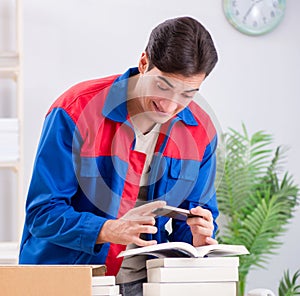 Worker in publishing house preparing book order