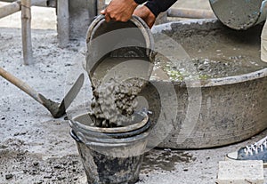 Worker put cement