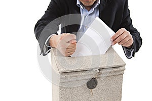 Worker putting letter in mailbox,showing a fig sign