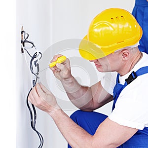 Worker putting wires