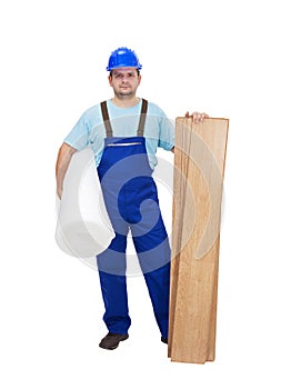 Worker ready to lay laminate flooring