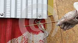 Worker during the remediation of asbestos from the roof