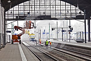 Worker repair the catenary