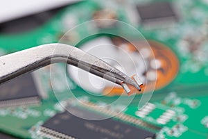 Worker repair green harddisk pcb