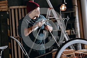 Worker repairing bike