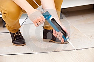 Worker repairing the floor