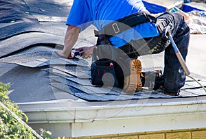 Worker Repairing the roof of a home