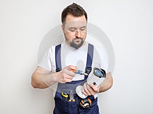 Worker reparing or setting up video CCTV camera